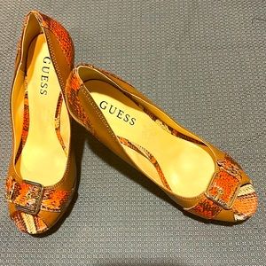 Guess open toe multi colored platform heels.